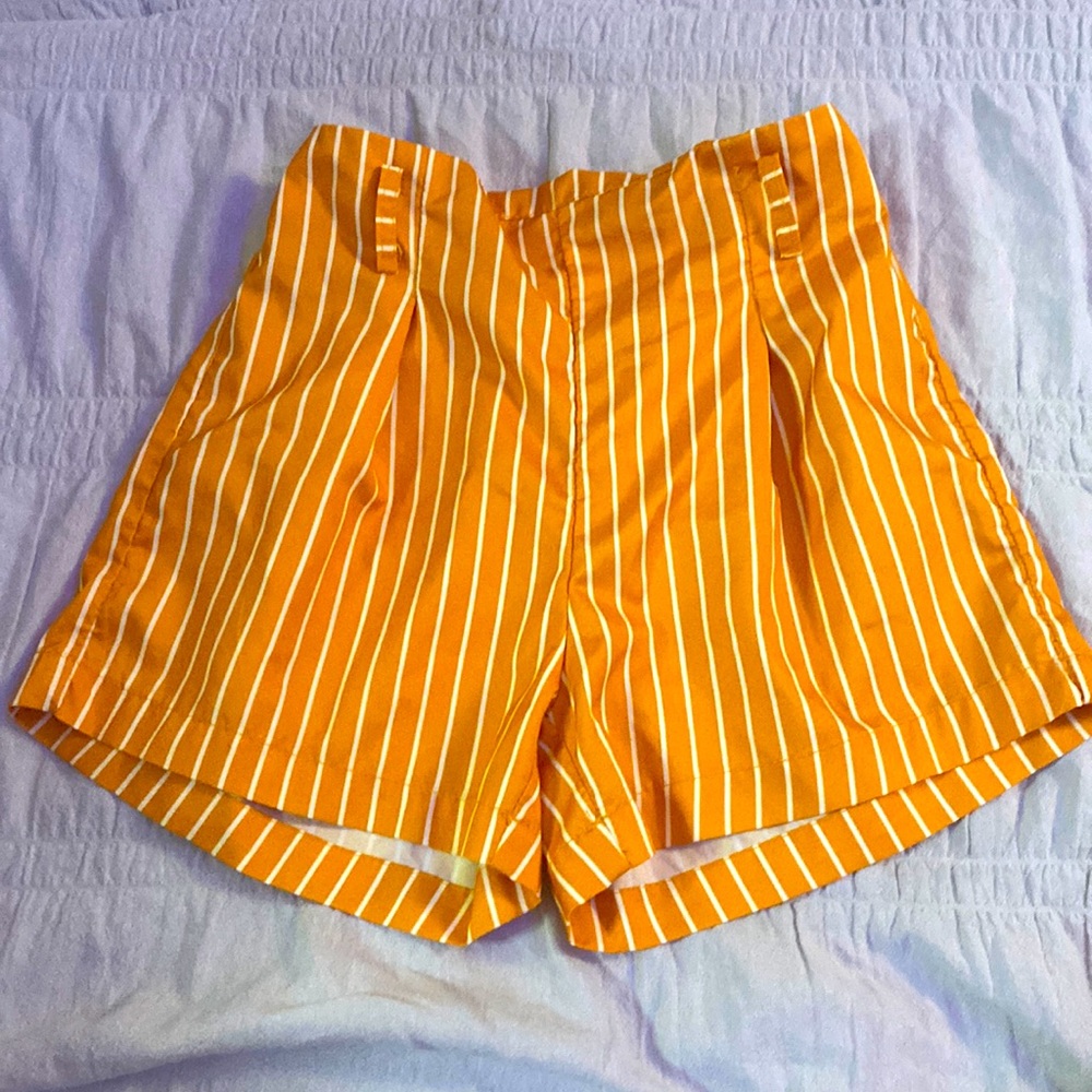 Neon orange orange shorts with white stripes